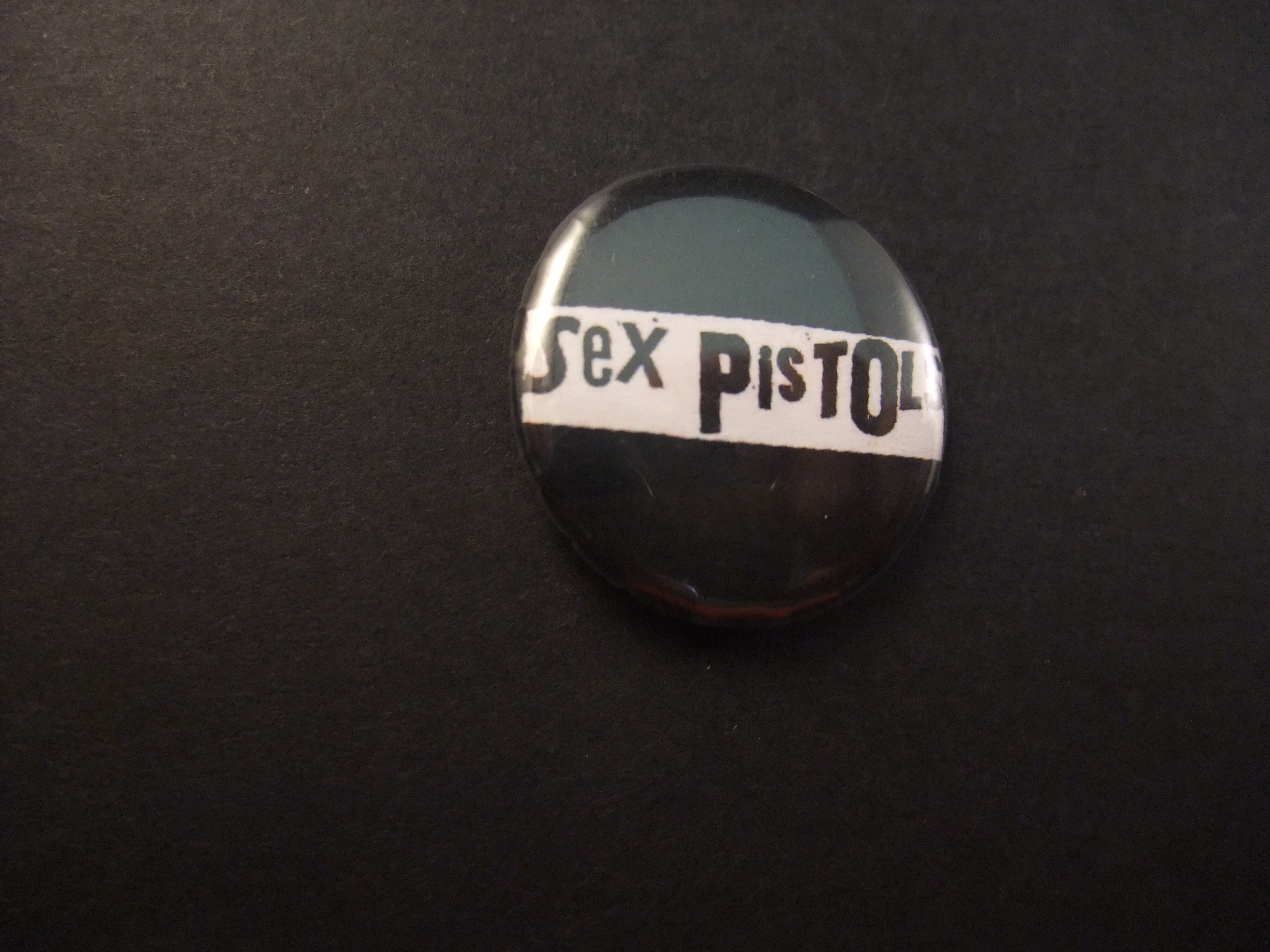 Sex Pistols Engelse punkgroep logo witte letters